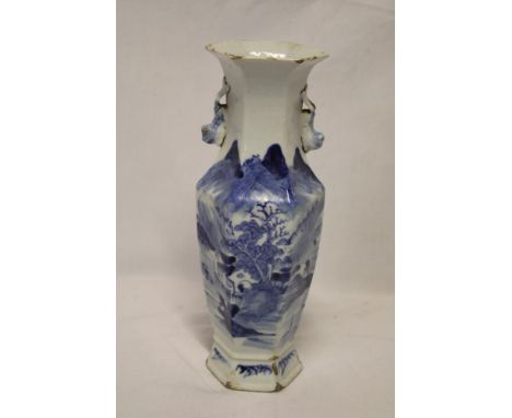 A 19th Century Chinese hexagonal pottery tapered vase with blue and white landscape decoration 10" high (af)