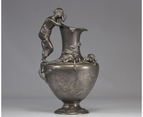Art Nouveau "verseuse" vase decorated with a young woman. The vase is decorated with a young woman as a handle. The vase also