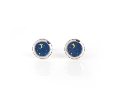 Harry Winston, a pair of white gold and enamel cufflinks, the circular glazed fronts each enamelled with a design of a night 