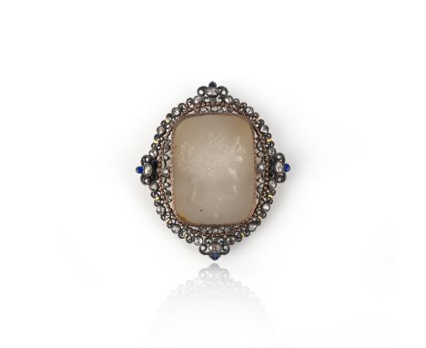 A chalcedony intaglio and diamond brooch, early 19th century, set with a section of chalcedony engraved with an intaglio of C