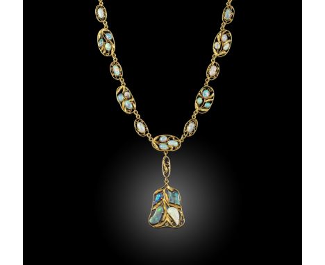 An Arts and Crafts opal necklace, early 20th century, designed as a series of oval foliate links set with opal cabochons, sus