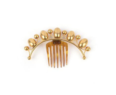 A gilt and tortoiseshell hair ornament, mid 19th century, designed as a row of oval and spherical motifs mounted on a headban