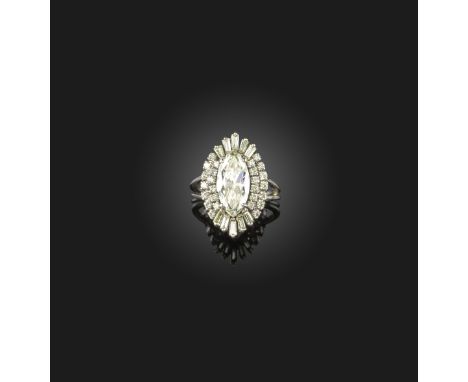 A diamond cluster ring, the marquise-shaped diamond weighing approximately 2.70cts within radiating surround of tapered bague