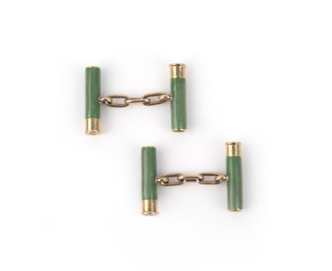 A Victorian pair of enamel cufflinks, late 19th century, designed as shotgun cartridges, applied with green enamel, mounted i