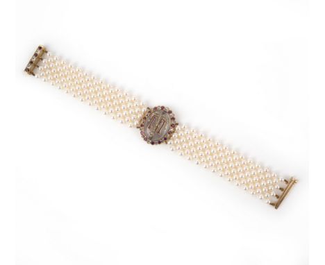 A ruby, rock crystal, diamond and cultured pearl bracelet, 19th century and later, centring on an oval cabochon rock crystal 