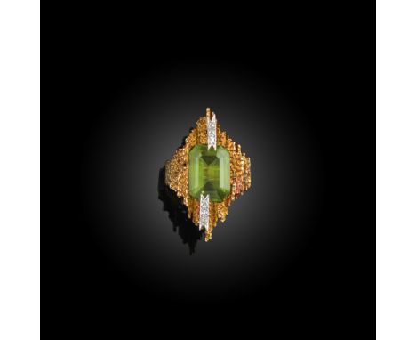 ‡ Andrew Grima, a peridot and diamond ring, circa 1968, the emerald-cut peridot with diamond accents set within textured abst
