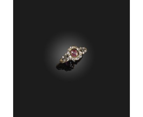 A Georgian ruby and diamond ring, early 19th century, of cluster design, set with an oval ruby within a border of rose-cut di