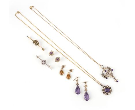 A group of jewellery, early 20th century, comprising: two amethyst and seed pearl pendants, lengths 5.2cm and 3cm, chain leng