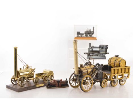 A collection of larger-scale Static Models, including an approx. 5" gauge 'Far East'-made Stephenson's Rocket in yellow and b