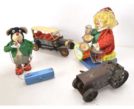 Various Tin  and Clockwork Toys, Sunrise Toys Japan battery operated tinplate Model T Ford in black with red seats and orange