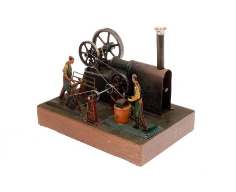 Liegender Heißluftmtor ”GHD”, uralt, mit Brenner, 2 Schwungrädern und Kurbelwelle, mit Schmied, Säger und Transmission, auf g