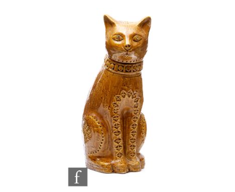 Aldo Londi - Bitossi - A mid 20th Century ceramic sculpture, modelled as a seated cat, decorated with impressed geometric Rim