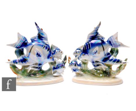 JEMA of Holland - A pair of 1960s ceramic models, depicting a cluster of stylised angel fish in blue with a lustre glaze, imp