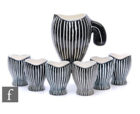 Charles Voltz - Vallauris - A mid Century French ceramic lemonade set, comprising large jug of footed ovoid form with lobed h