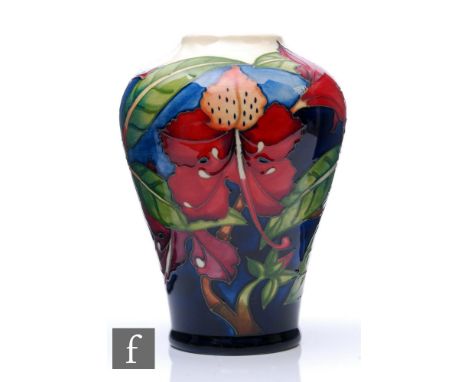 Philip Gibson - Moorcroft Pottery - A vase of high shouldered tapering form, shape 576/9, decorated in the Simeon pattern wit