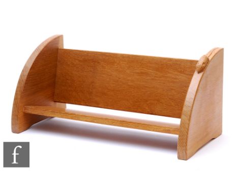 Workshop of Robert 'Mouseman' Thompson - An oak book trough with carved 'mouse' signature, height 21cm, width 46cm and depth 
