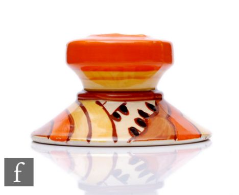 Clarice Cliff - Sharks Teeth - A shape 331 candlestick of shallow circular form, hand painted with brown, orange and yellow b