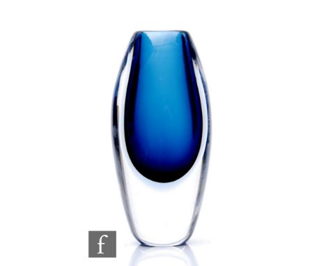 Vicke Lindstrand - Kosta - A sommerso glass vase of compressed ovoid form, cased in clear crystal over a deep petrol blue cor