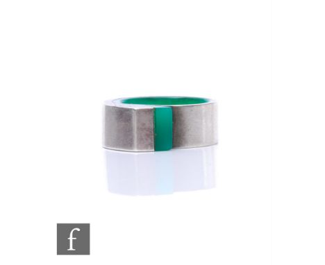 Carole Leonard - A contemporary silver and Perspex ring, of spiral form with green Perspex core, with receipts. 