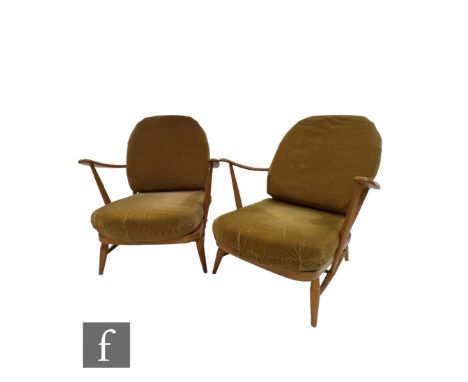 Lucian Ercolani for Ercol Furniture - A pair of beech framed model 203 Windsor armchairs, with loose cushion seats and backs,