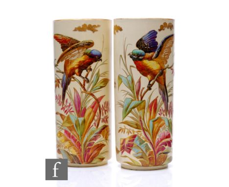 Montereau B &amp; Cie - A pair of late 19th Century ceramic vases of footed sleeve form, each hand painted and gilded with ex