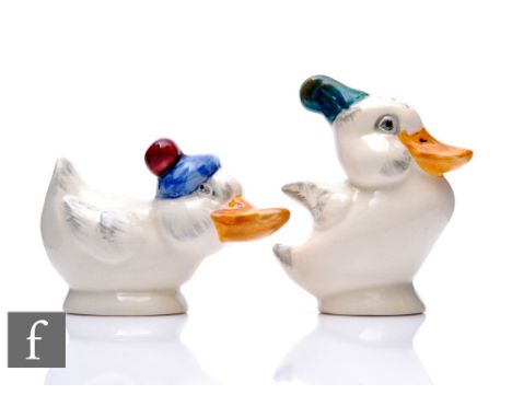 Clarice Cliff - Shorter &amp; Sons - A pair of novelty salt and pepper pots modelled as novelty ducks each wearing a differen