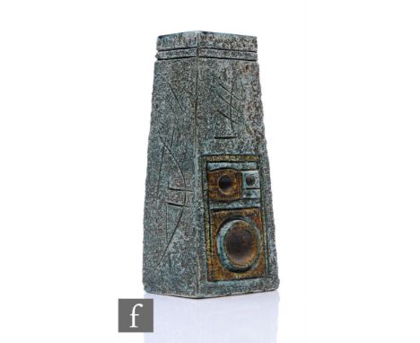 Troika - Avril Bennet - A Coffin vase circa 1973-1979, decorated with relief carved abstract designs picked out in tonal blue