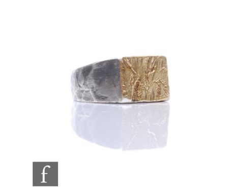 Bjørg&nbsp;Nordli-Mathisen - A contemporary silver 'Might Have Been' ring, with a textured surface plated in 18k gold to the 