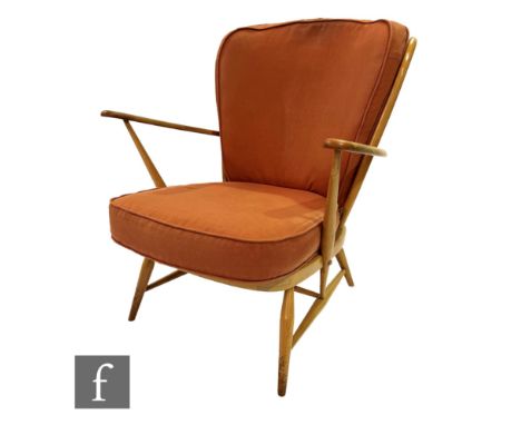 Lucian Ercolani for Ercol Furniture - A model 335 easy chair or armchair with beech spindle frame, with terracotta cloth upho