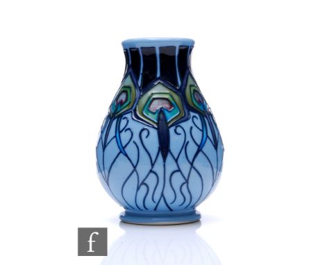 Nicola Slaney - Moorcroft Pottery - A small vase of ovoid form with flared neck, shape 7/2, decorated in the Peacock Parade p