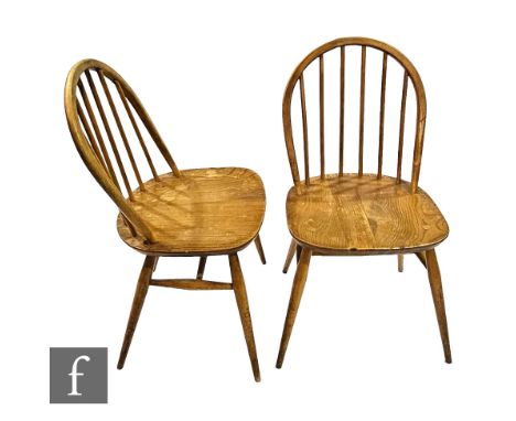 Lucian Ercolani for Ercol Furniture - A set of seven Windsor elm and beech dining chairs to include five model 370 chairs and