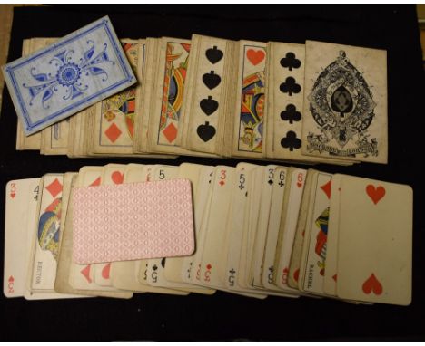 A collection of 19th century playing cards, comprising part sets by Goodall & Son, London, examples of the Paris pattern, etc