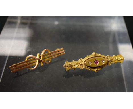 Brooches - a late Victorian diamond and ruby three stone brooch, 15ct gold mount, Chester 1899, steel pin, 3.4g gross;  anoth