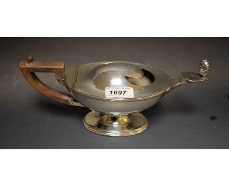 A Goldsmiths and Silversmiths Company plated spoon warmer in the form of an Aladin's lamp 