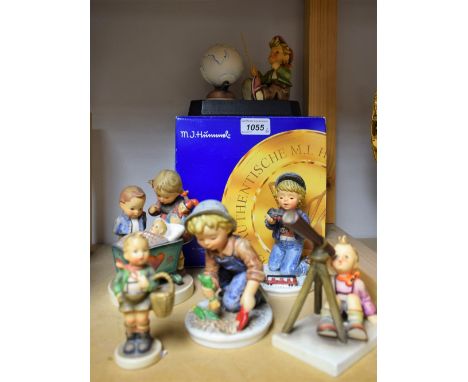 A Goebel Hummel ceramic figure, European Wanderer, boxed; others, Blessed Event, Boy With Train, Stargazer, etc (6)