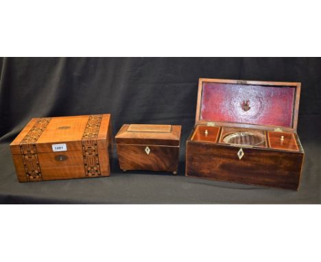 A Victorian mahogany inlaid tea caddy with compartments and mixing bowl apperture; another smaller tea caddy; a Victorian Tun