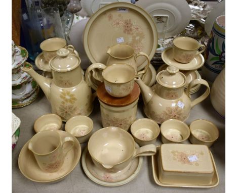 A Denby Sandalwood part dinner and tea set comprising dinner plates, side plates, coffee pot, teapot, jugs, butter dish, rame