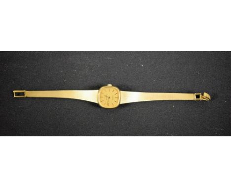 Eterna - a lady's bracelet watch,  tv dial, block batons, ridged hands, quartz movement, 9ct gold case and integral strap, st