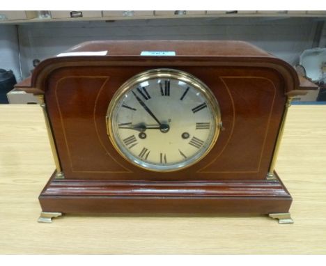 Edwardian Mahogany cased striking mantel clock with turned brass pillars and ogee bracket feet H24cm