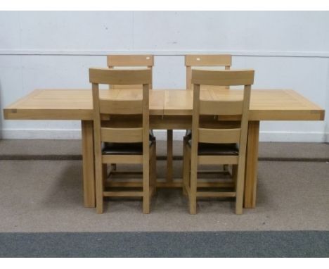 Solid light oak extending dining table (L151cm x W90cm) with two leaves (L227cm) and four ladder back chairs with leather sea