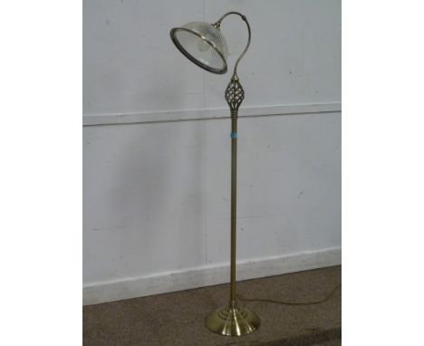 Bronzed metal standard lamp with glass shade and a Tiffany style stained glass shade