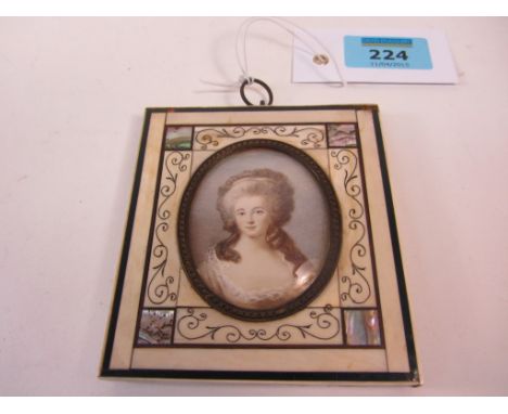 Late 19th/early20th century oval portrait miniature of a lady in light brown dress 6cm
