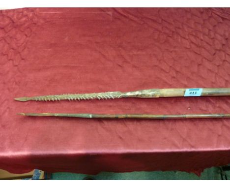 Tribal light weight spear with carved bone head and decorated bamboo type shaft 137cm and another spear with barbed iron head