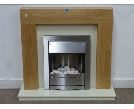 Electric fire with pebble decoration set into oak surround, W100cm, H92cm