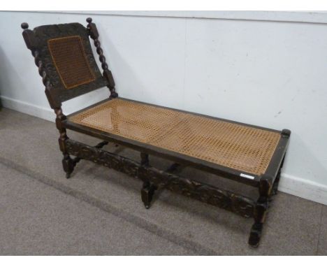 19th century carved stained beech day bed lounger with adjustable back rest, cane seat, L150cm