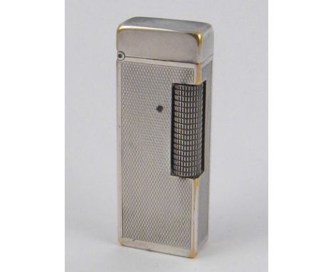 A silver plated Dunhill gas lighter.