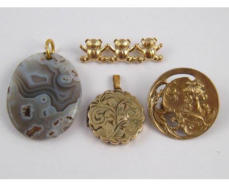 A mixed lot comprising a teddy bear brooch marked 375, an agate pendant a silver brooch and a gold filled locket.