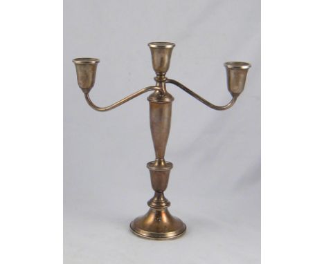 An American silver three light candelabrum by Towle, marked sterling silver. 26cm. across x 30cm. high. 