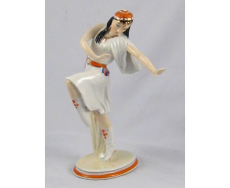 A Russian ceramic figure of a dancer, Dulevo green stamp with "2C 33" to base, also red factory mark. 23cm. 