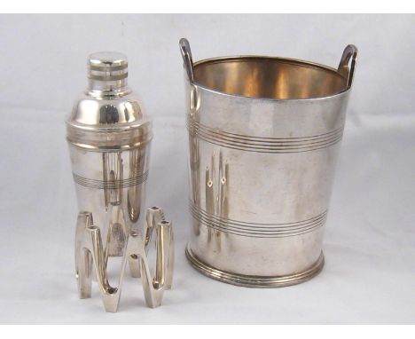 Silver plate. A Dansk 1970s six light candlestand, a cocktail shaker and a champagne bucket, ht.23cm.